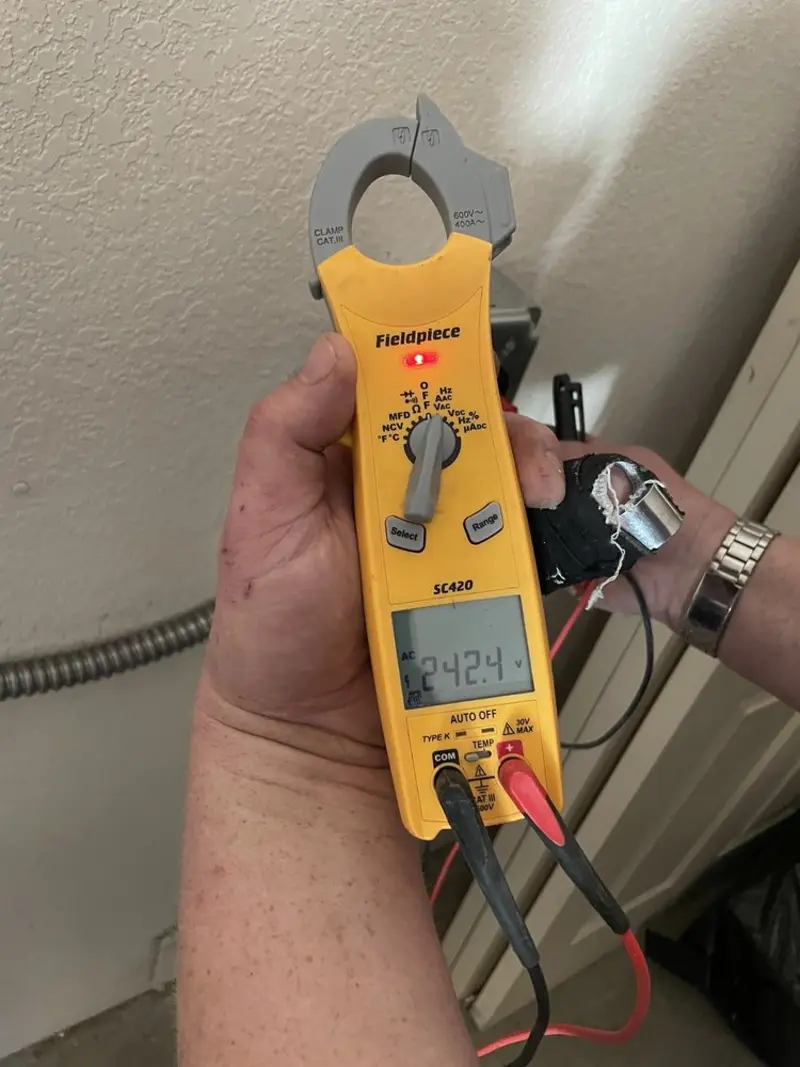 Voltage testing with clamp meter during Electrical Installation Services in Berkeley